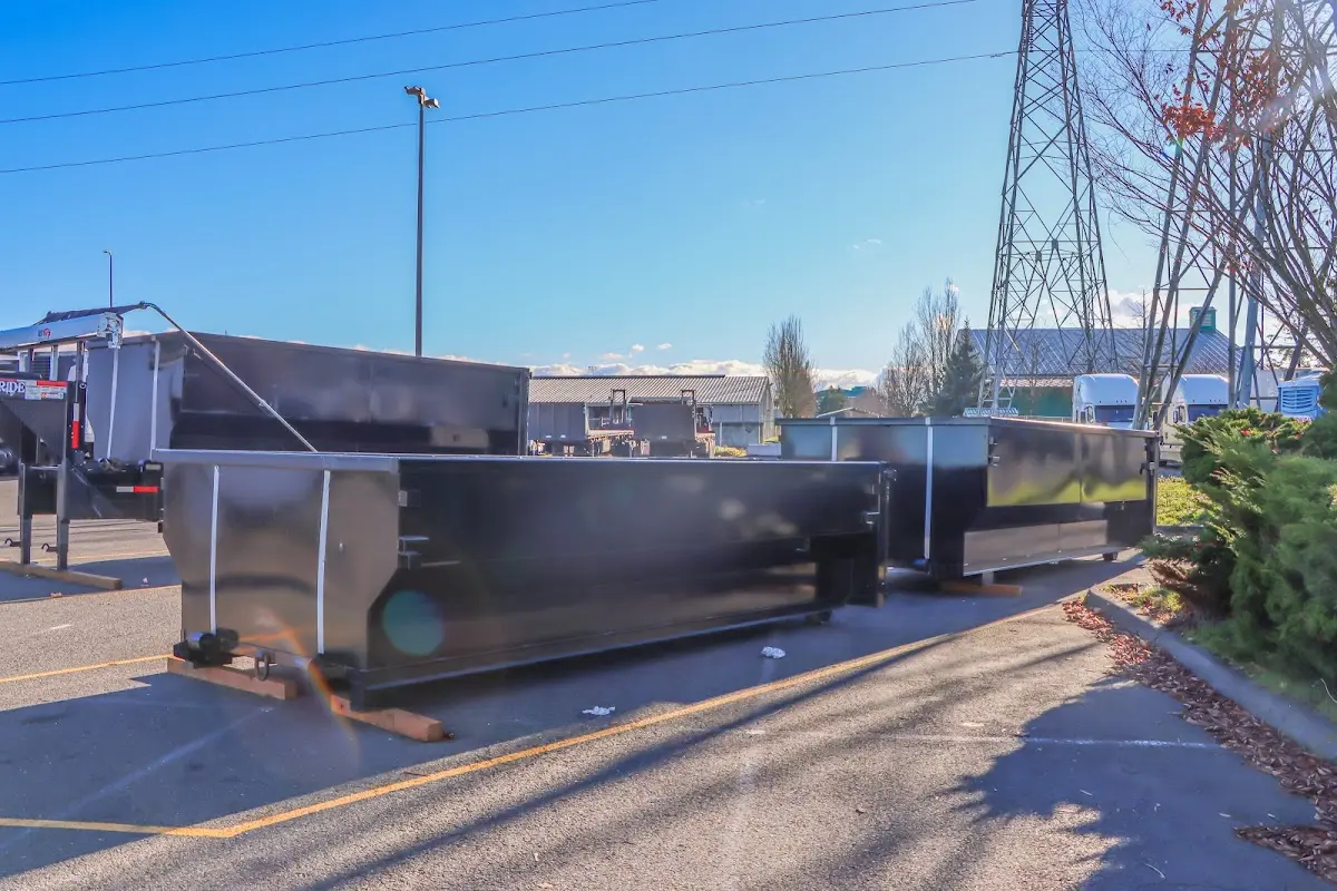 Roll-off dumpster ready for waste disposal at job site for 12 Yard Dumpster Rental in Wilmington